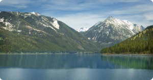 Scenic view of Wallowa Lake and the mountains in the background.