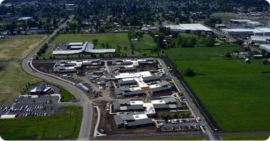 an ariel view of the veterans home with solar panels on top