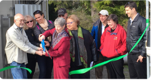 From left to right: City of Astoria Councilor Drew Herzig, Councilor Cindy Price, Councilor Zetty Nemlowill, Mayor Arline LaMear, Councilor Russ Warr, Sheila Holden, Pacific Power, Peter West, Energy Trust, Charlene Larsen, Pacific Power Blue Sky customer, Jed Jorgensen, Energy Trust