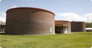 brick cylindrical buildings at the Pendleton Wastewater treatment plant