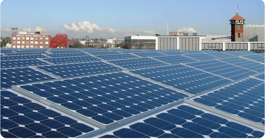 solar panels in front of a Portland skyline