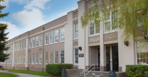 exterior view of a tan school building