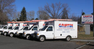 Griffin Heating trucks lined up in front of Griffin Heating.