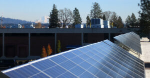 Rooftop solar array with Mt Hood in the background