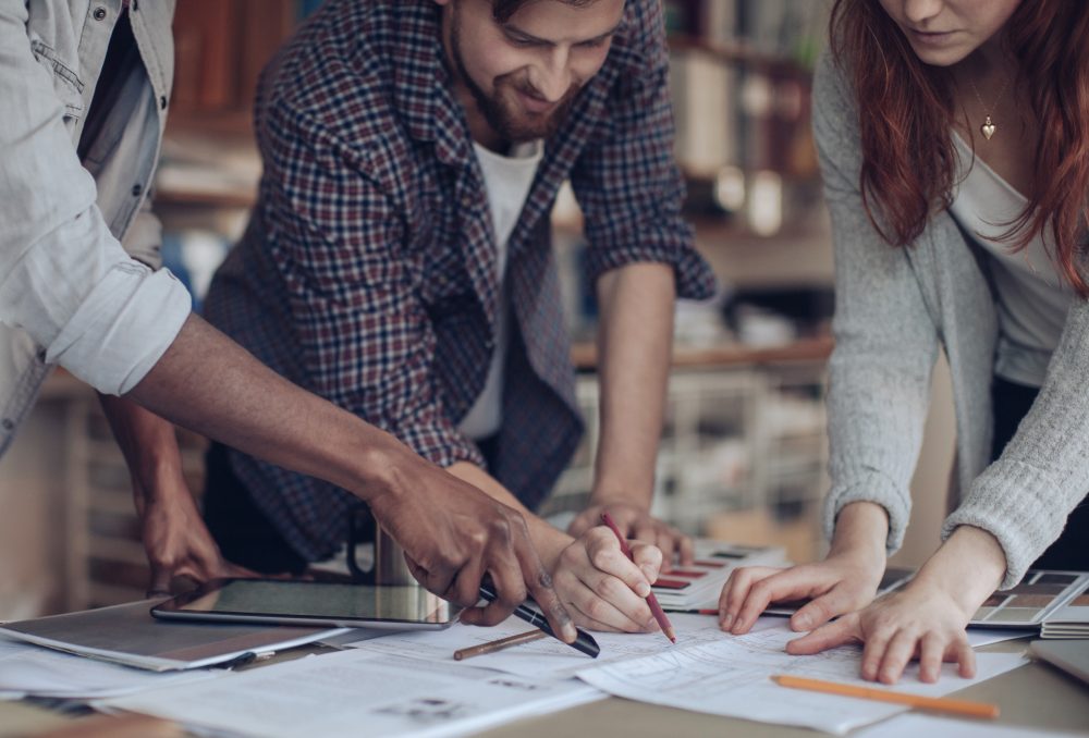 Close up of a designers working on a project