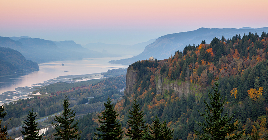 beautiful sunset overlooking a river and fall foliage. The Columbia gorge