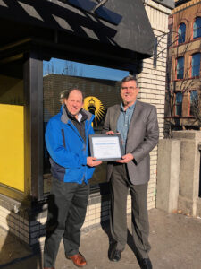 Peter West from Energy Trust with an award