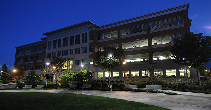 an office building at night with pleasant lighting