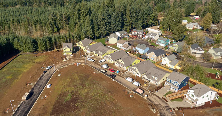 Aerial shot of houses in neighborhood.