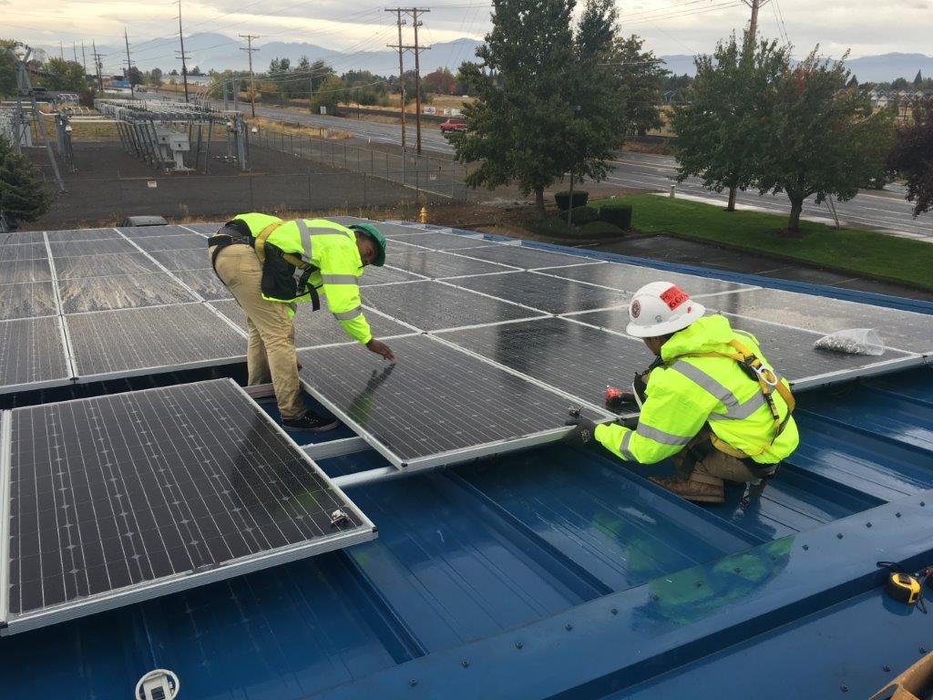 Workings installing solar