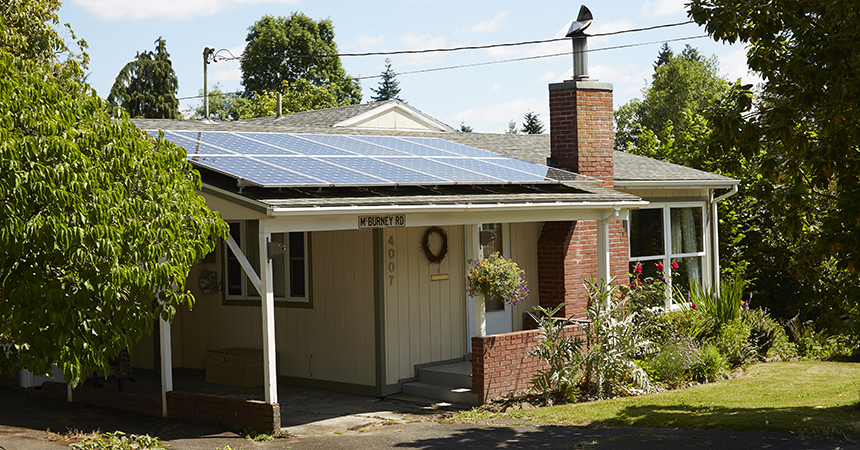 a home with solar panels on the roof