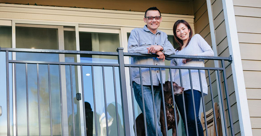 Couple standing on porch