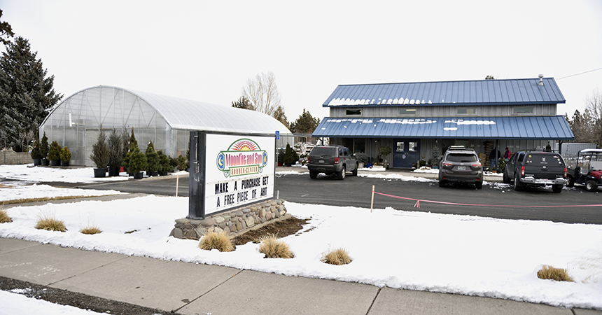 Outside of garden center with greenhouse