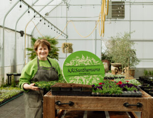 gardener in greenhouse