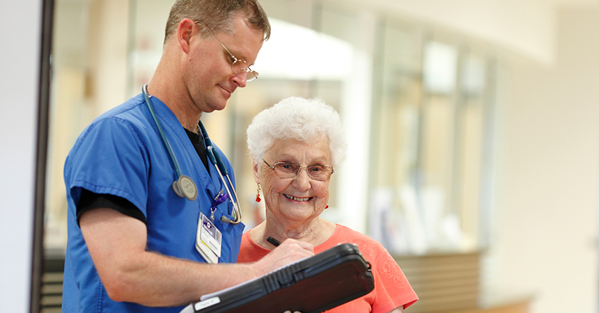 a medical professional and an older woman