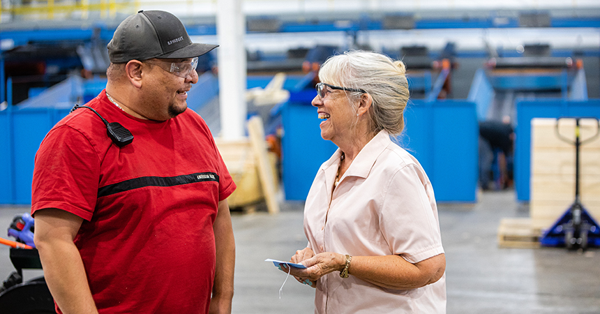 Two employees chatting