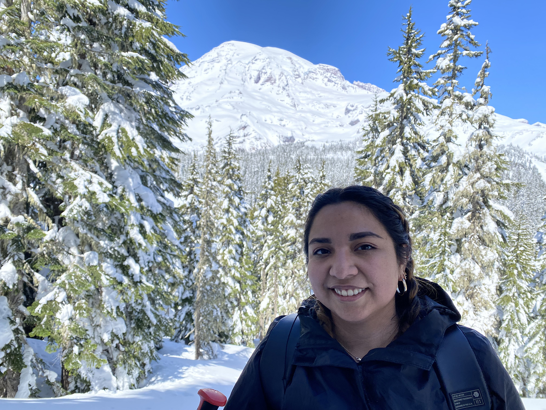 Woman in front of mountain