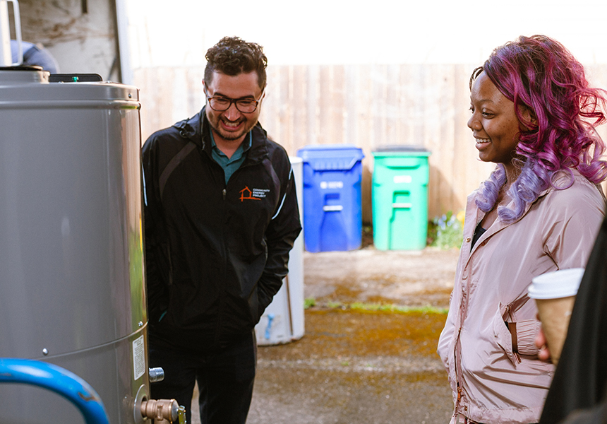 Man and contractor with water heater