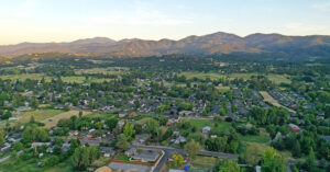 Landscape image of mountains and urban area in Rogue Valley